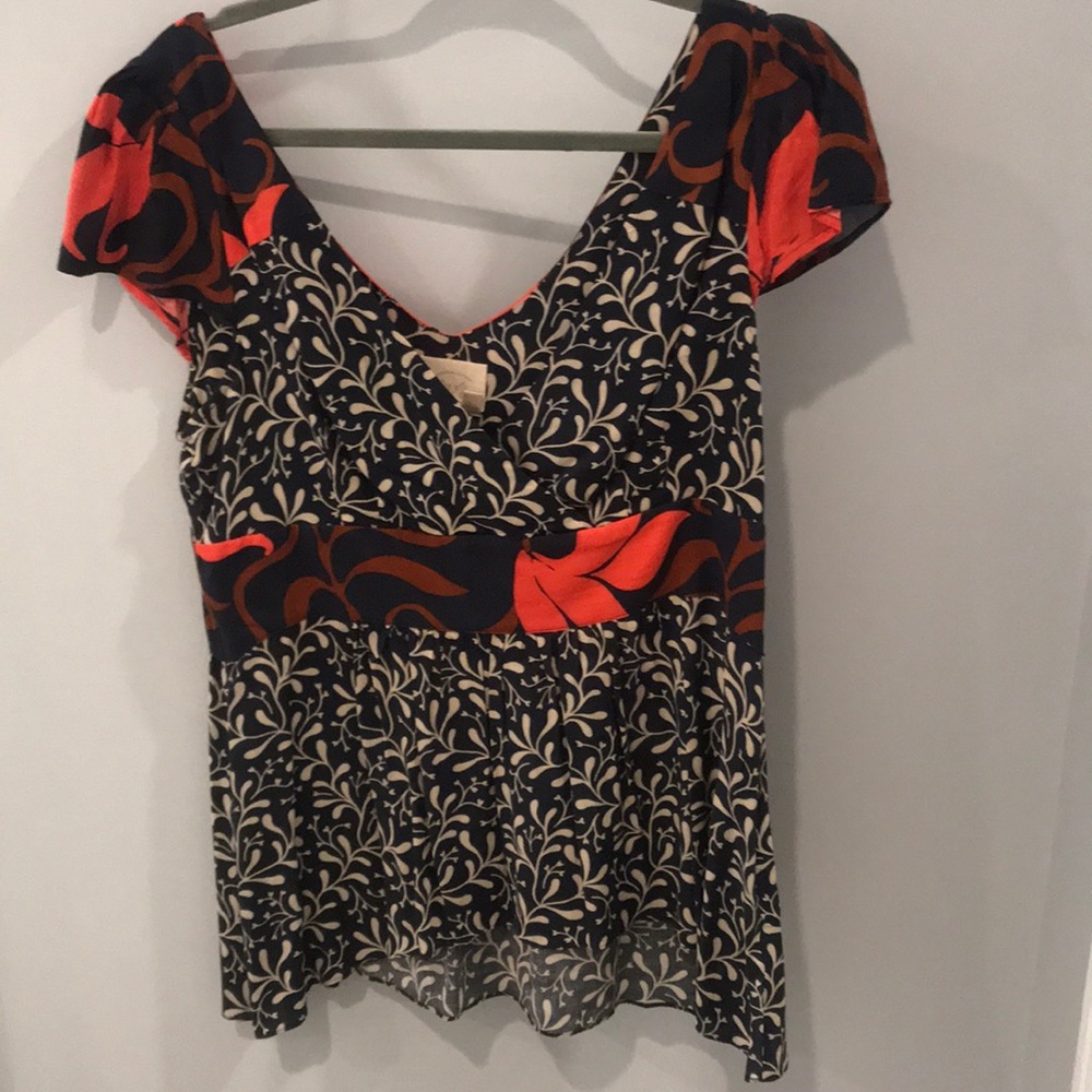 Beautiful navy, orange, and cream blouse